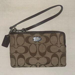 Brown Wristlet with Logo Pattern